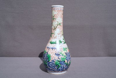 A Chinese wucai bottle vase with birds in a garden, Transitional period